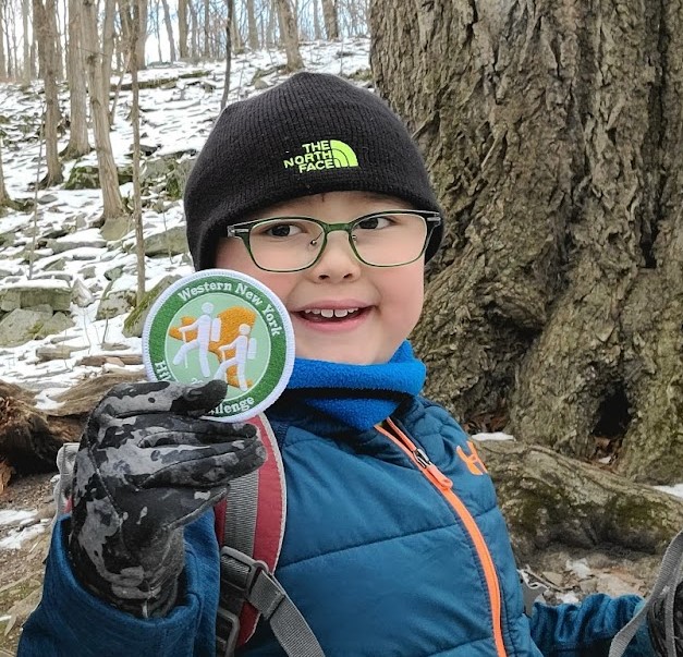 Kid with WNY hiking challenge patch